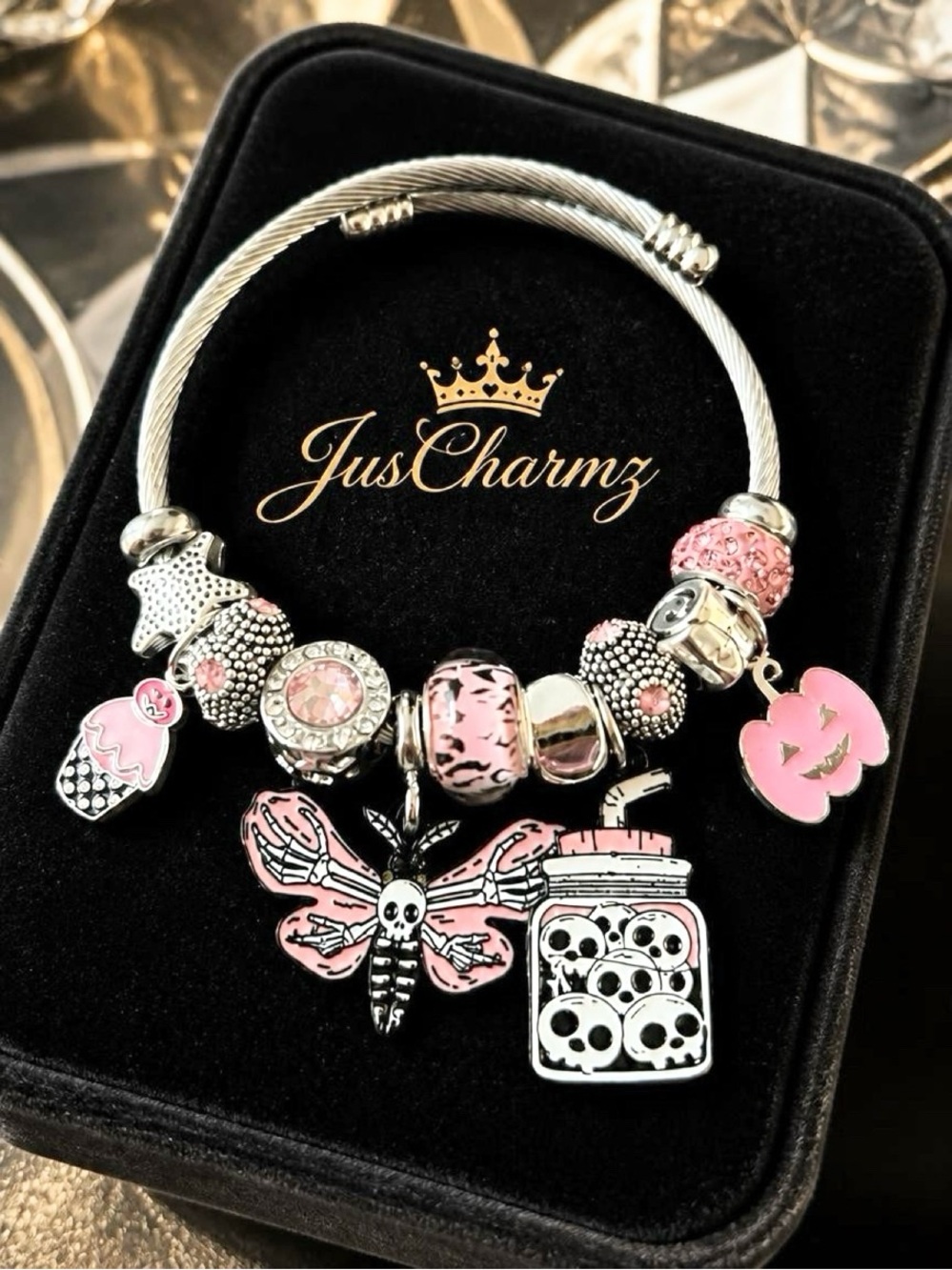 Pink Charm Bracelet with Skull & Butterfly Charms